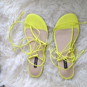 Neon yellow lace up flat